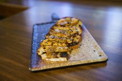 Pate on a piece of toast served in restaurant