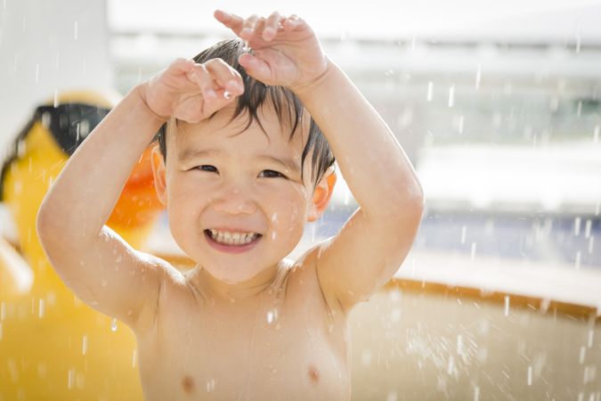 Smiling Boy Having Fun at the Water Park