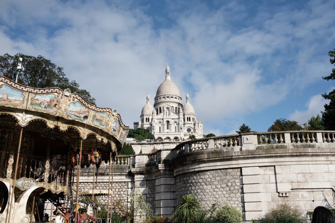 Elegant big cathedral with rocked fence on blue sky