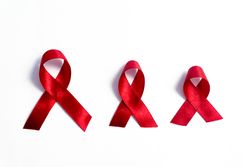 Red ribbons, HIV awareness concept, world AIDS day, world hypertension day, world cancer day