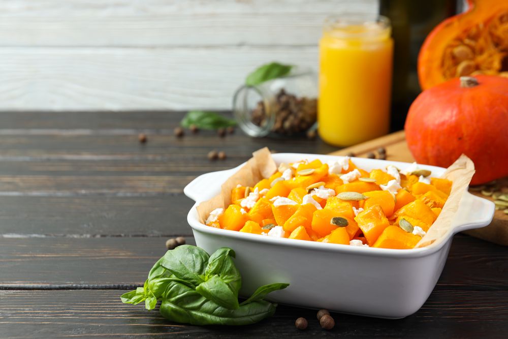 Concept of tasty homemade dish - baked pumpkin