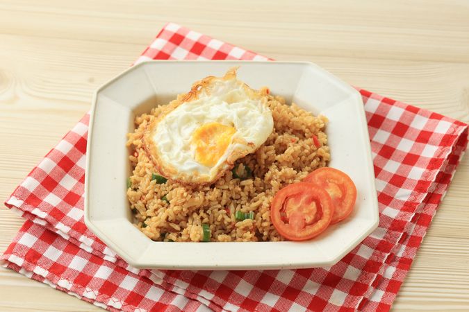 Nasi Goreng Indonesian, Stir Fry Fried Rice with Garlic, Shallots, and Soy Sauce.