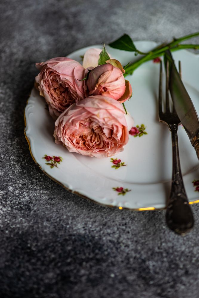 Floral card with pink roses on table setting