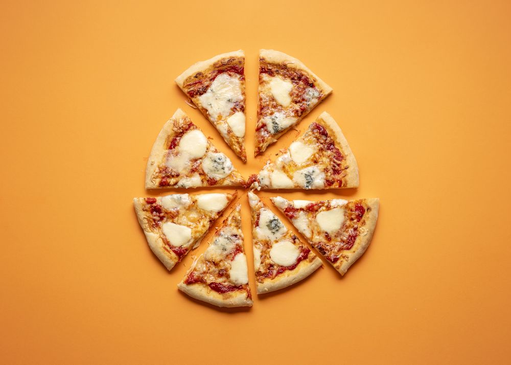 Sliced 4 cheese pizza