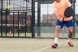 Young man playing paddle tennis