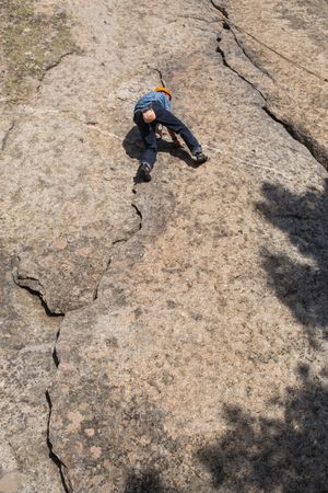 Free climber climbing in nature