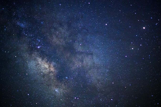 Milky way galaxy with stars and space dust in the universe, Long exposure photograph, with grain.