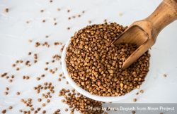 Top view of organic raw buckwheat seeds in a bowl on table  41lMAp
