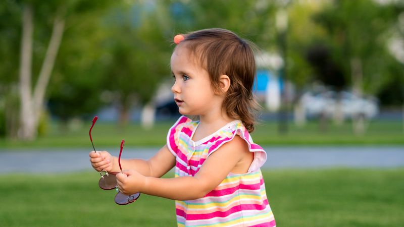 Toddler in park for summer