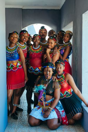Zulu wedding dancers pose in outside hallway