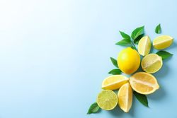 Flat lay composition with citrus on color background, space for text