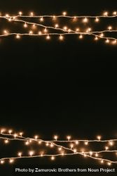 Fairy lights or Christmas lights on dark background bGAPX5