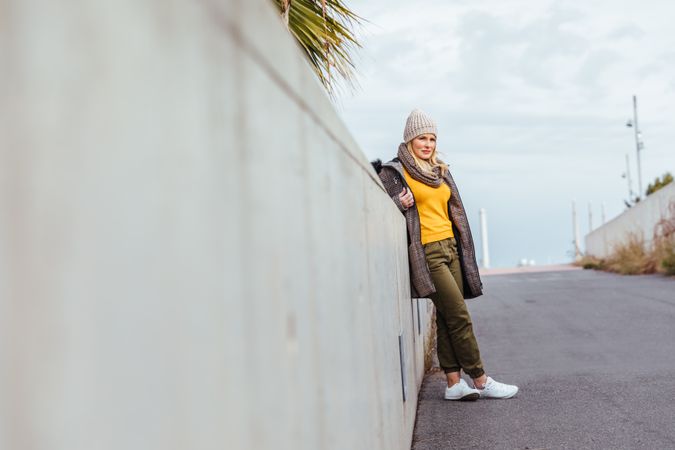 Portrait of blonde woman posing in the city