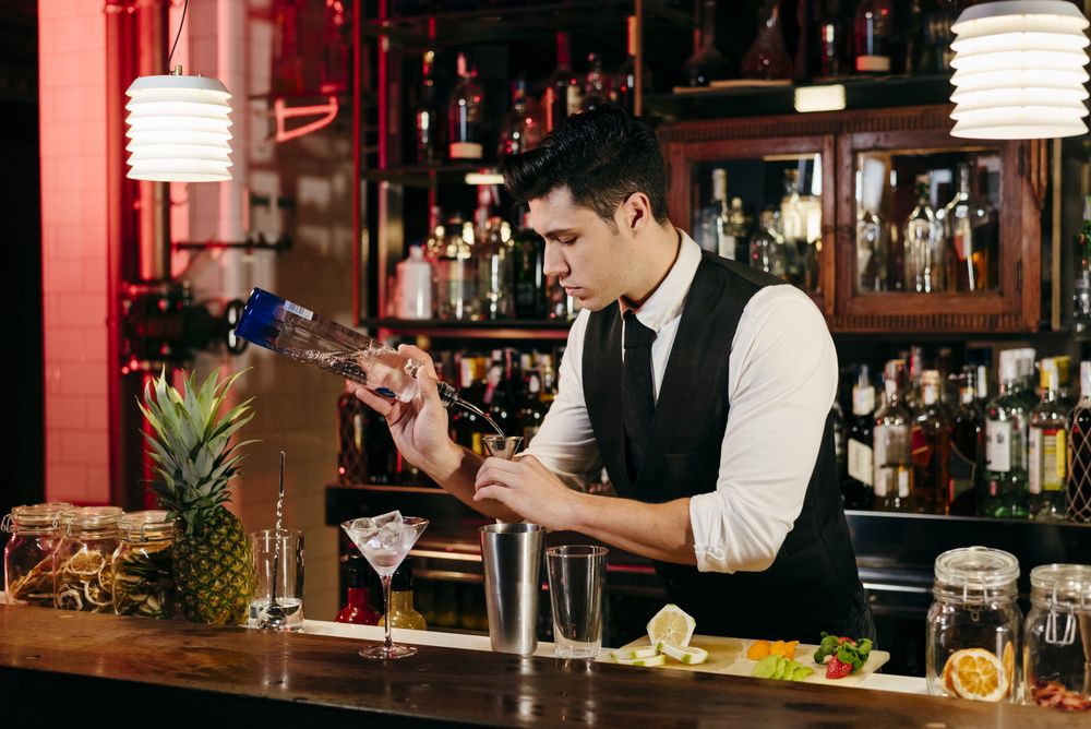Barman working making drinks