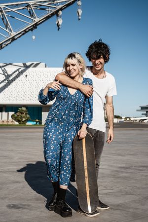 Couple standing near modern building