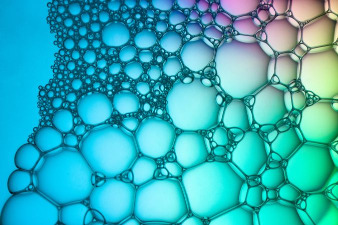 Abstract background bio technology, macro photography foam and water with gradient background. Molecule multicolor backgorund