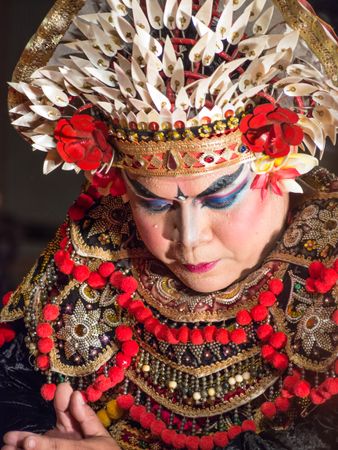 Bali, Indonesia - August, 15 2015: Indonesian woman dancing traditional dance