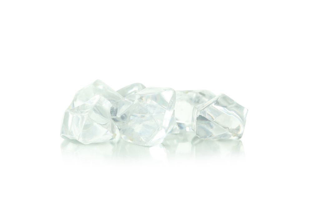 Several ice cubes on blank background