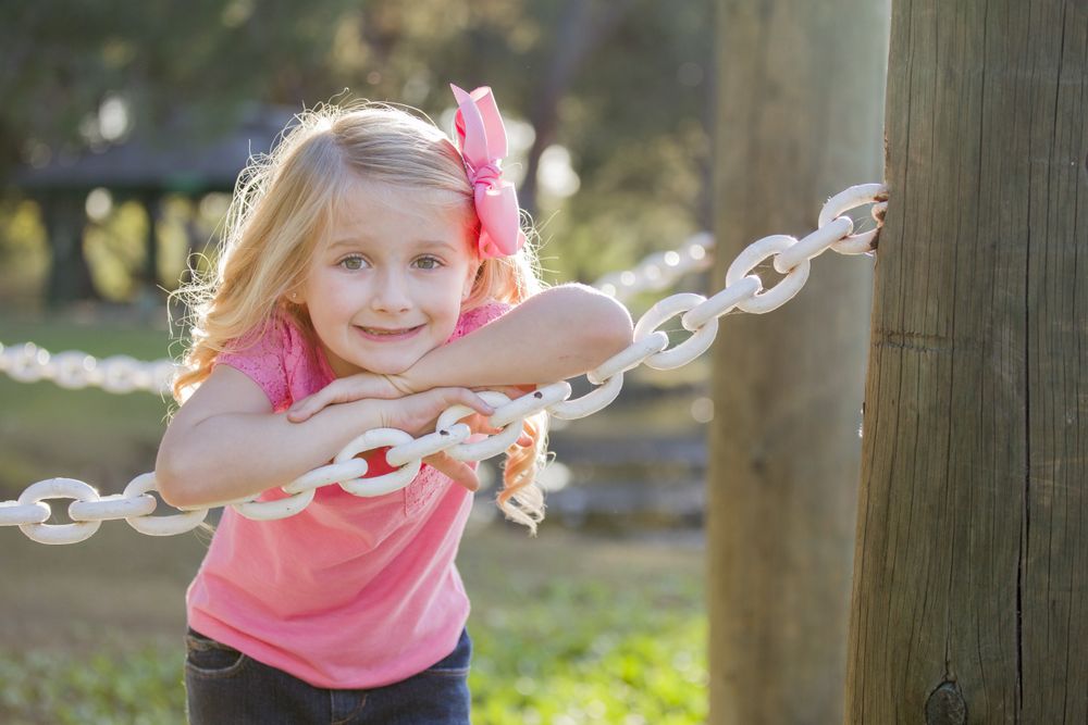 Cute Young Girl Portrait at the Park