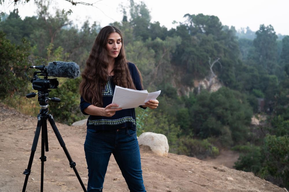 Female director looking pensively at the script