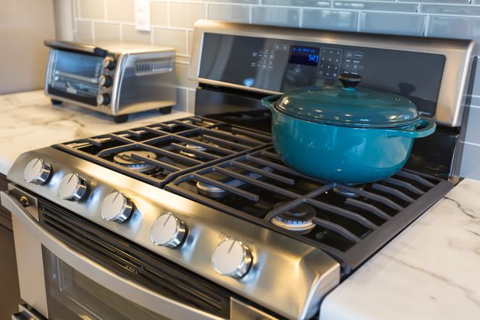 Beautiful Kitchen Stove with Cooking Pot and Toaster Oven