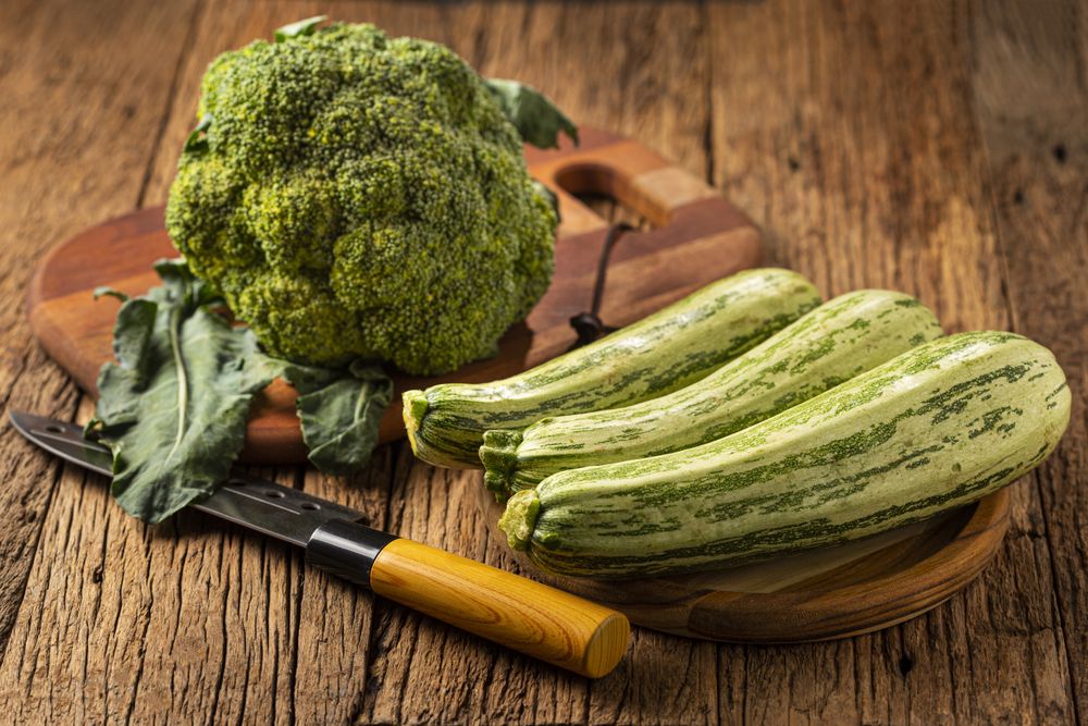 Zucchini and Broccoli on the table.