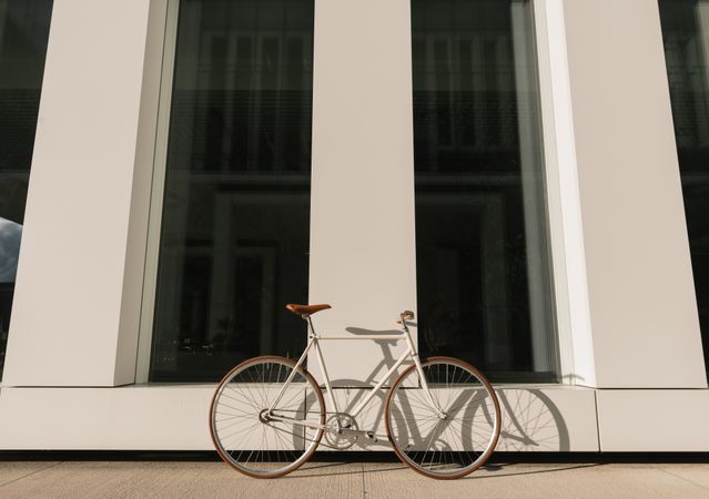 Bicycle parked outside modern building