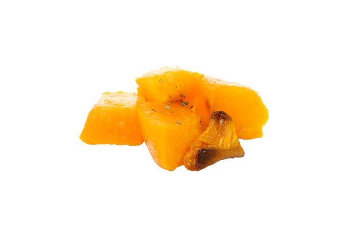 Baked pumpkin isolated on light background