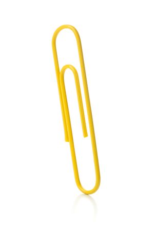 Yellow paper clip isolated on neutral background
