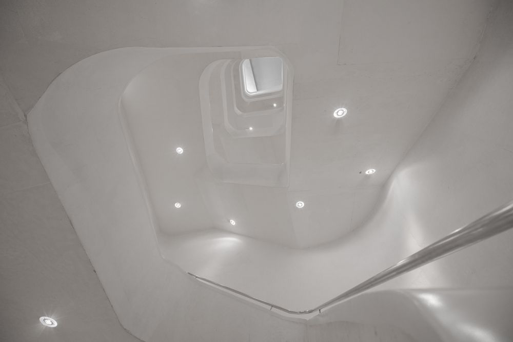 Amazing modern hall interior with white stairway