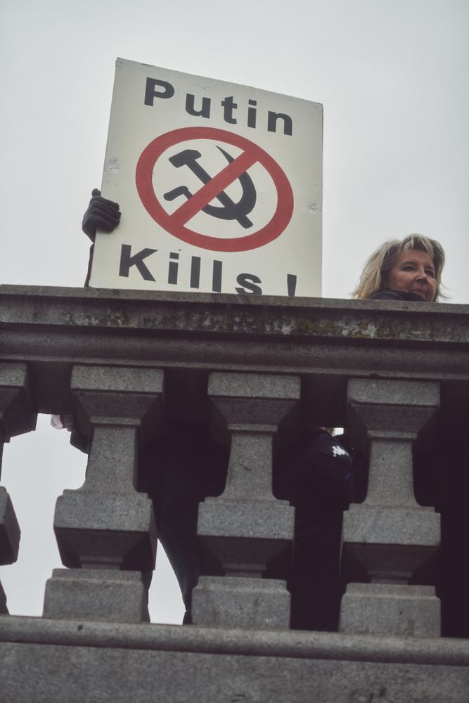 London, England, United Kingdom - March 5 2022: Woman with “Putin Kills” sign