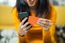 Female using her phone to shop online