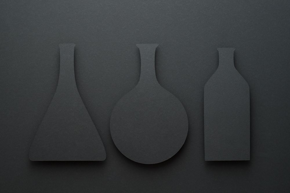 Paper cut outs of chemistry beakers
