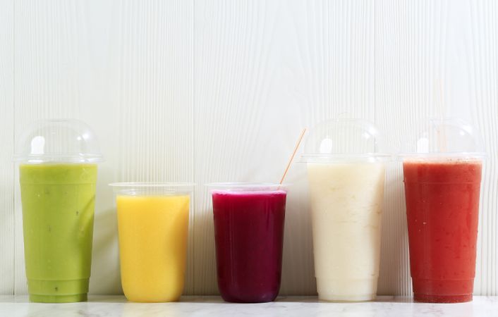 Different Color Juice on Plastic Cup Packaging