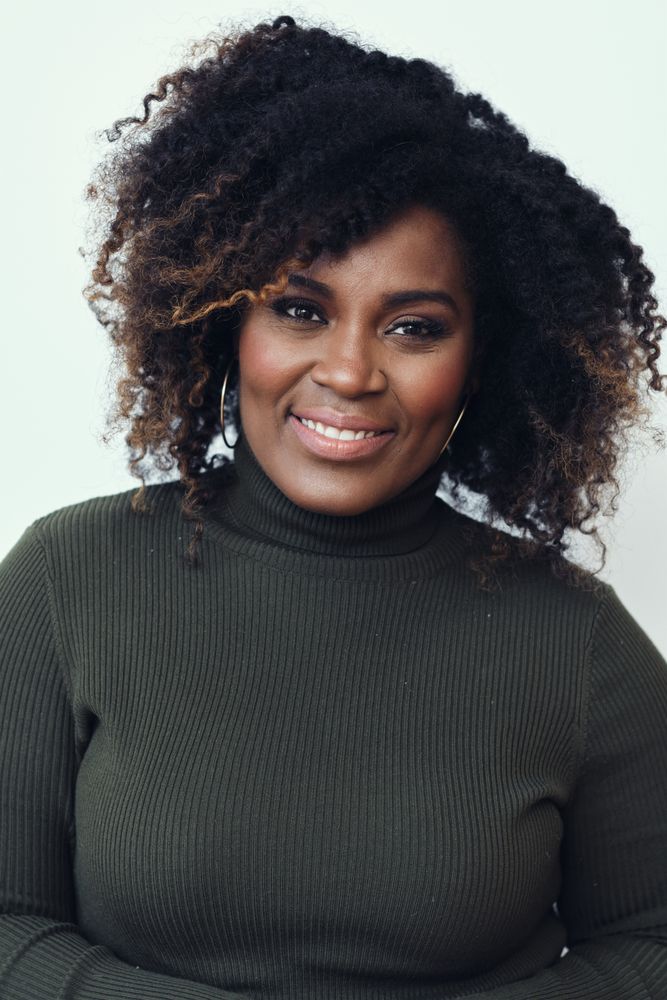 Portrait of a content Black smiling calmly at the camera