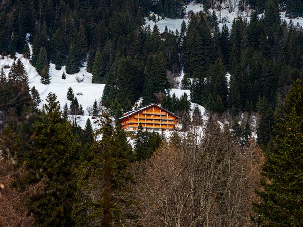 Swiss Alps winter landscape with snow and sun, mountains in Europe