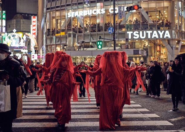 Japan - Tokyo, Shibuya Japan - November 29th, 2019: Red Rebel Brigade walking on Shib