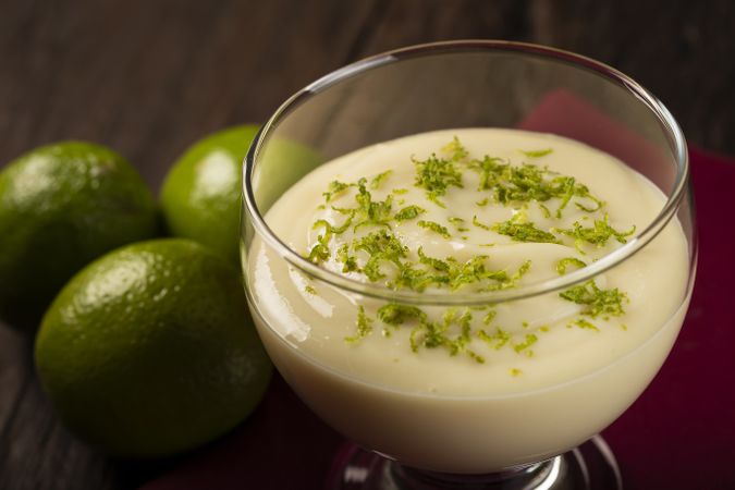 Lemon mousse with lemon zest on top.