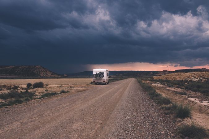 Trailer standing on side of empty road