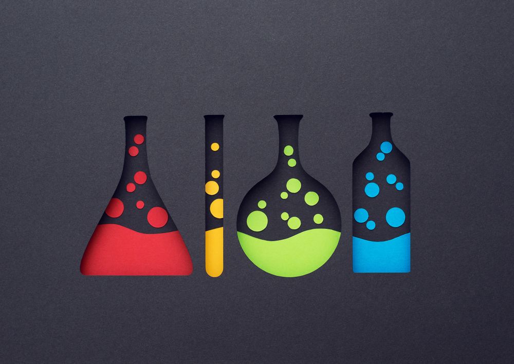 Colorful chemistry testing flasks, jar and tube paper cut outs