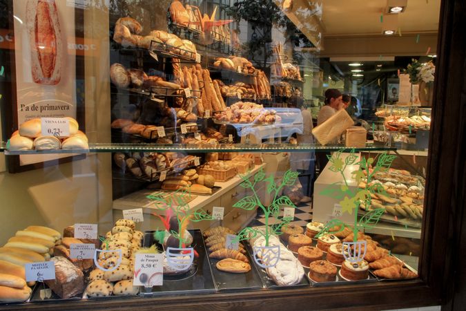 Bakery store front showcasing types of pastry and bread