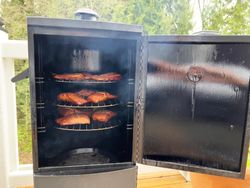 Smoker with smoked fish inside