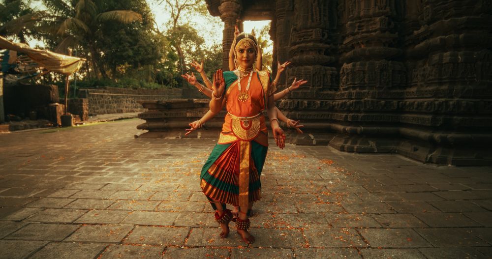Portrait of Indian Women in Traditional Clothes Dancing Bharatanatyam in Colourful Sari