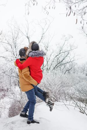 Rear shot of two teenagers in winter coats