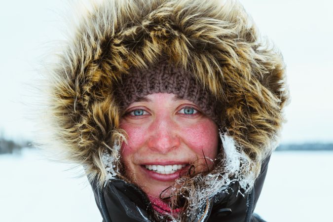 Portrait of woman in fur coat smiling