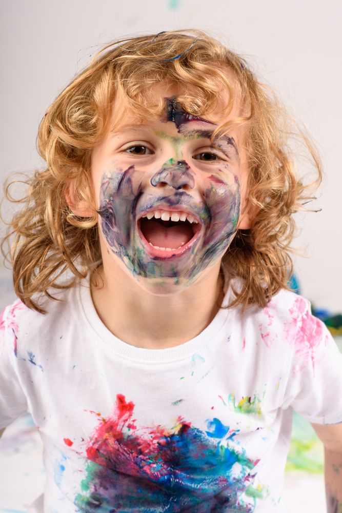 Cheerful boy with painted face