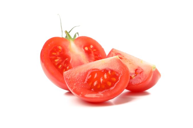 Fresh ripe tomato isolated on neutral background