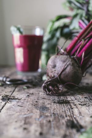 Beetroot and fresh smoothie on wooden table
