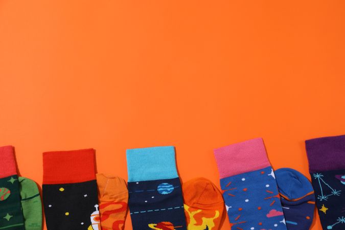 Casual clothes and wearing concept - socks, clothes for foot