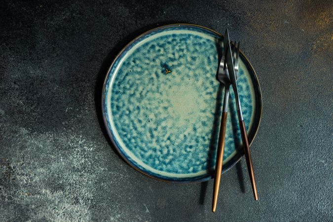 Empty bowl as a teal table setting concept